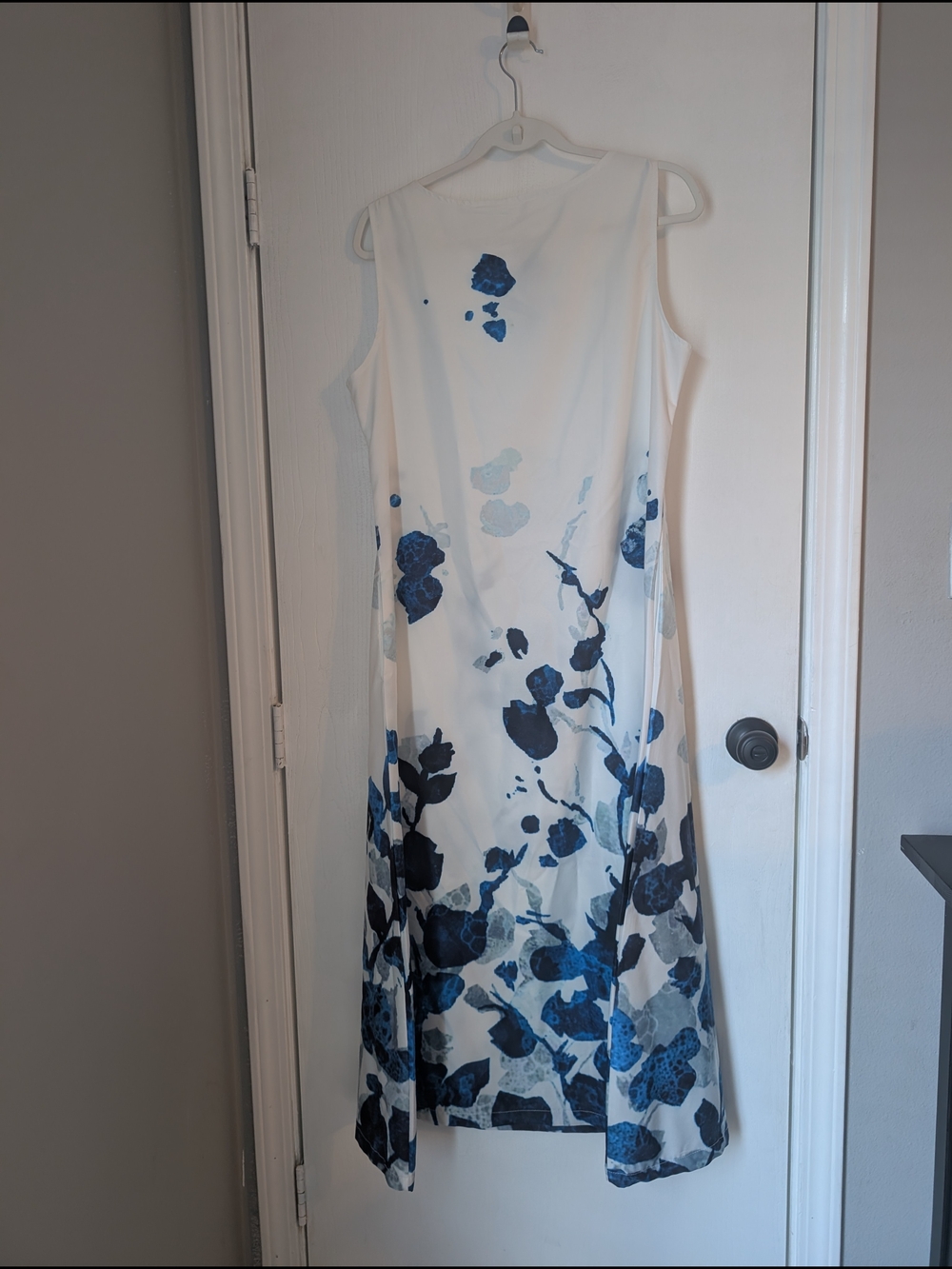 Sleeveless White Maxi Dress with Blue Floral Print